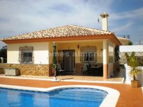 Outside view of house and pool